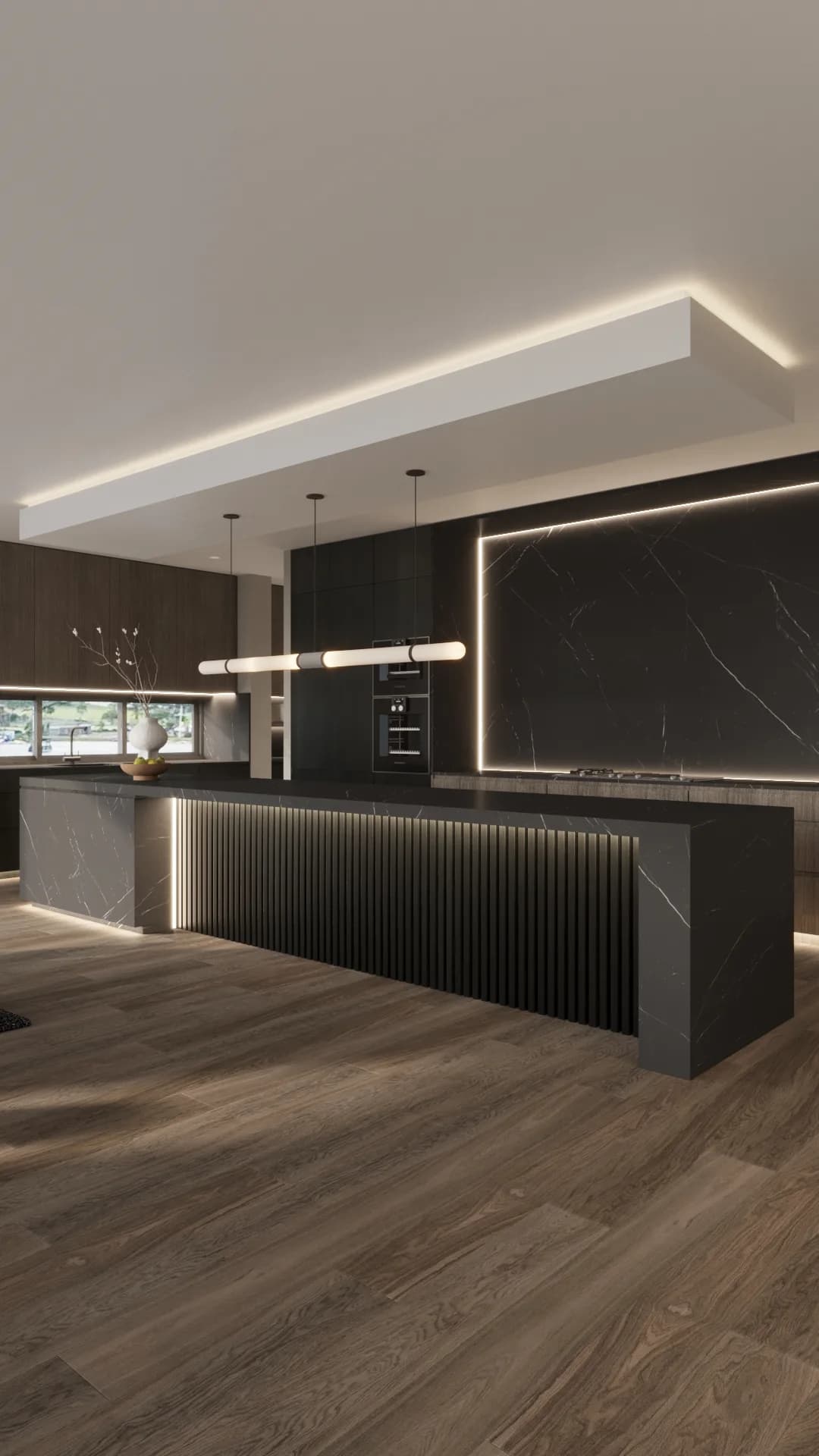 Monochrome kitchen with a veined black marble island, fluted charcoal panelling and illuminated stone splashback