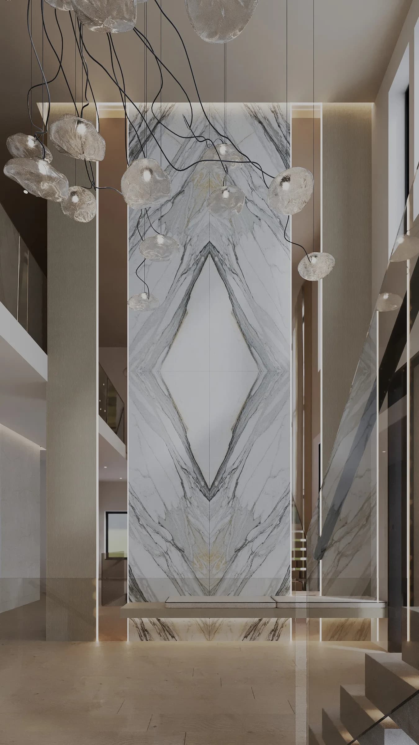 Double-height foyer centred on a book-matched marble wall with fluted panels