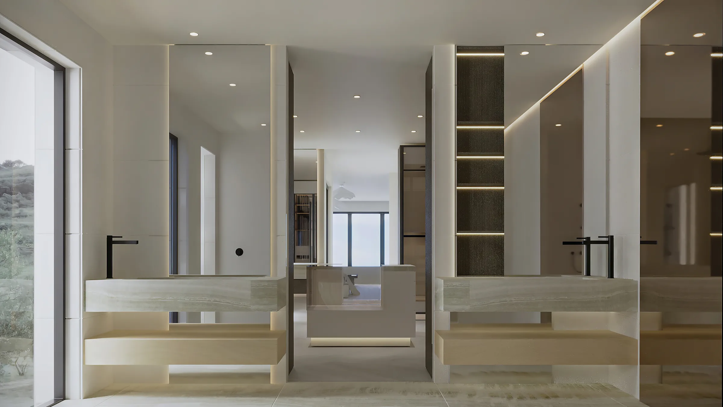 Ensuite vanity with floating pale stone basins, dark timber shelving and softly backlit full-height mirrors
