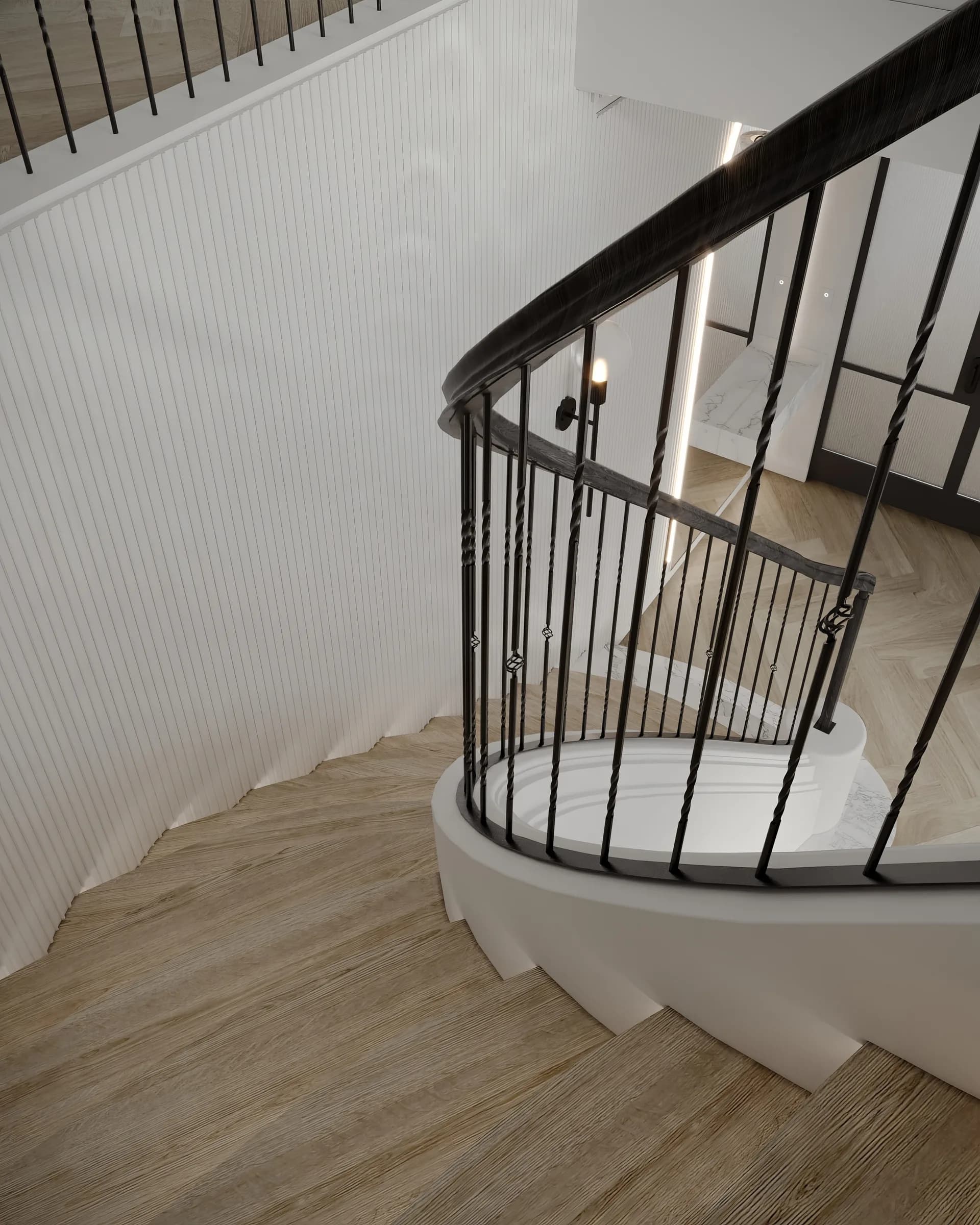 Upper landing looking down a curved timber staircase with black iron rails, white panelling and concealed strip lighting