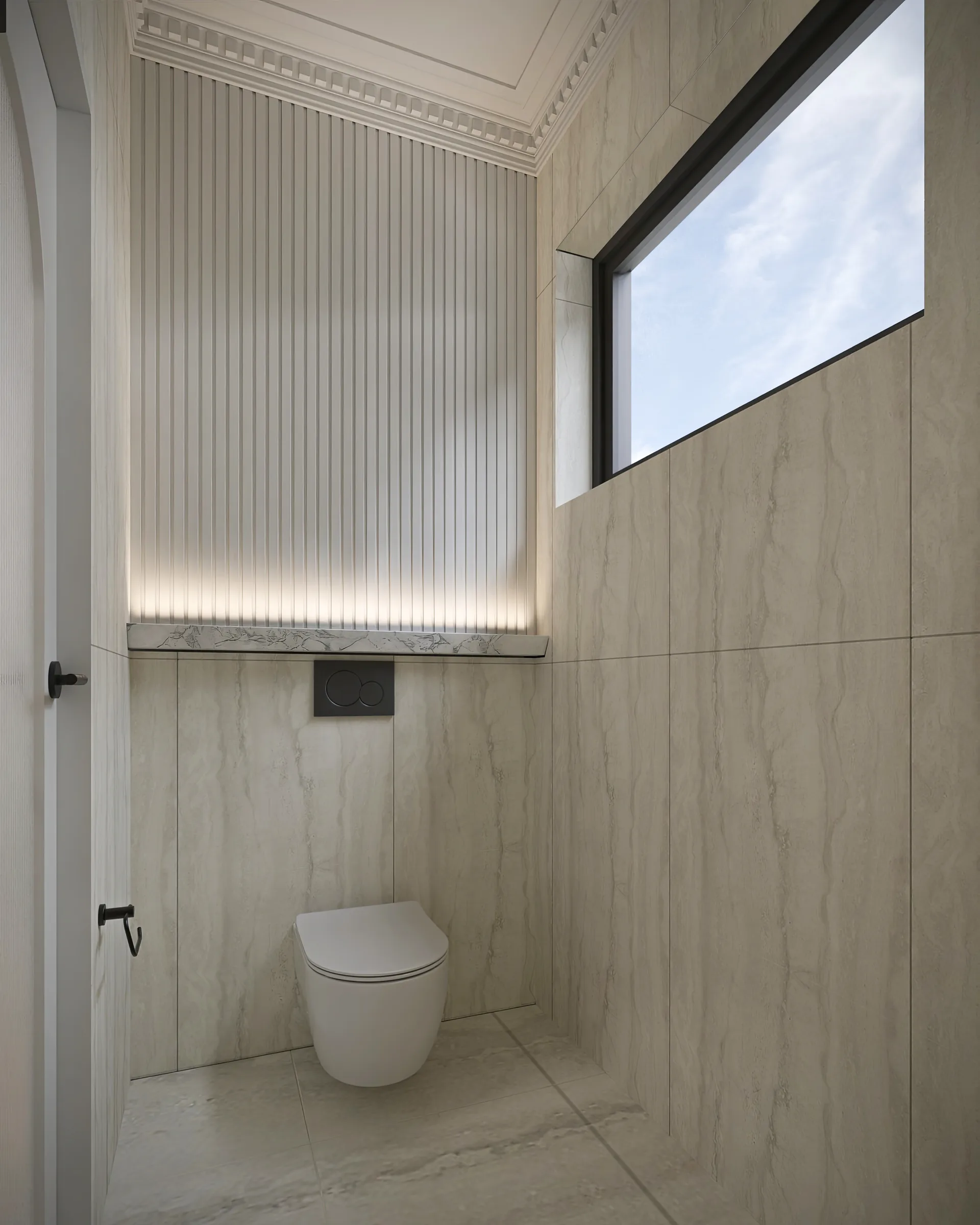 Compact powder room wrapped in pale stone, with a high black-framed window and illuminated fluted panelling