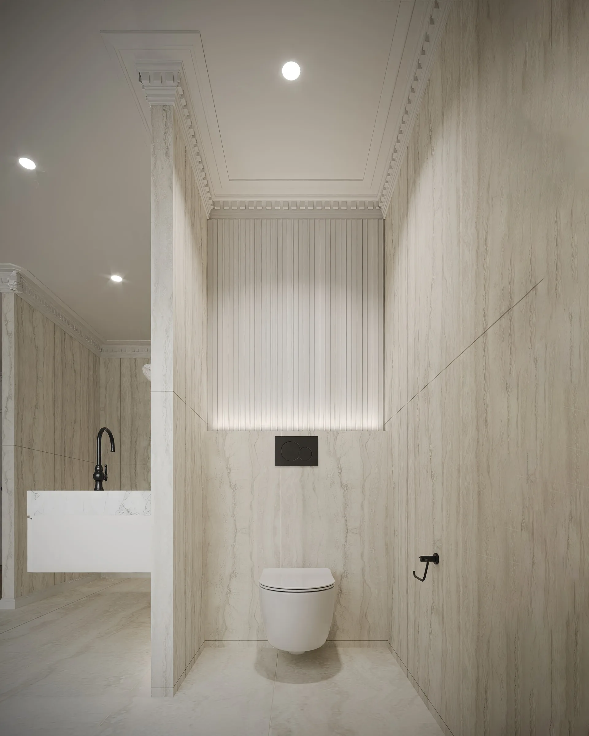 Pale stone bathroom with a wall-hung toilet, fluted panelled alcove, black fittings and traditional cornices