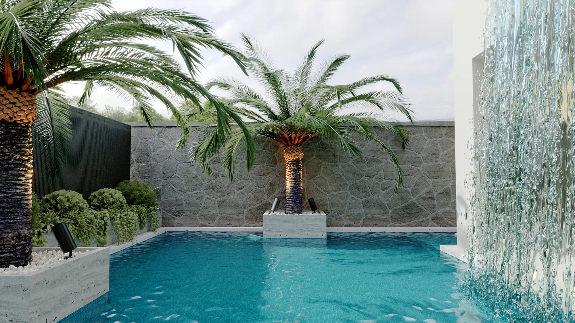 Turquoise courtyard pool bordered by palms, a grey stone wall and a broad sheet of water cascading from white masonry