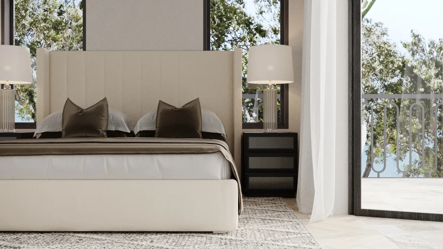 Ivory upholstered bed with taupe velvet cushions, fluted glass lamps and sheer curtains opening to a leafy balcony