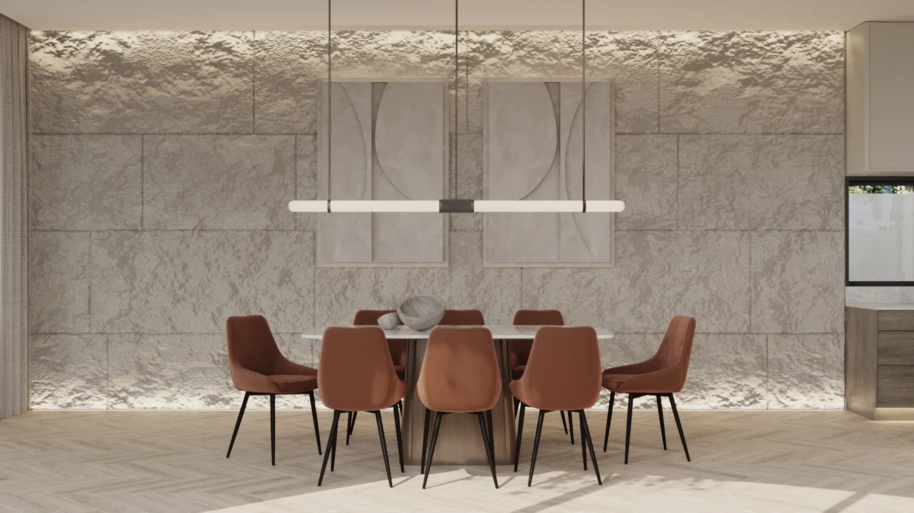 Dining room with terracotta velvet chairs, a pale stone table and an illuminated textural stone feature wall