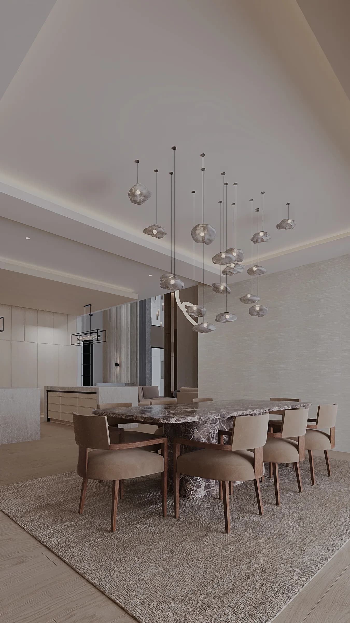 Formal dining room with a dark veined marble table, timber-framed chairs and a cascading cluster of glass pendants