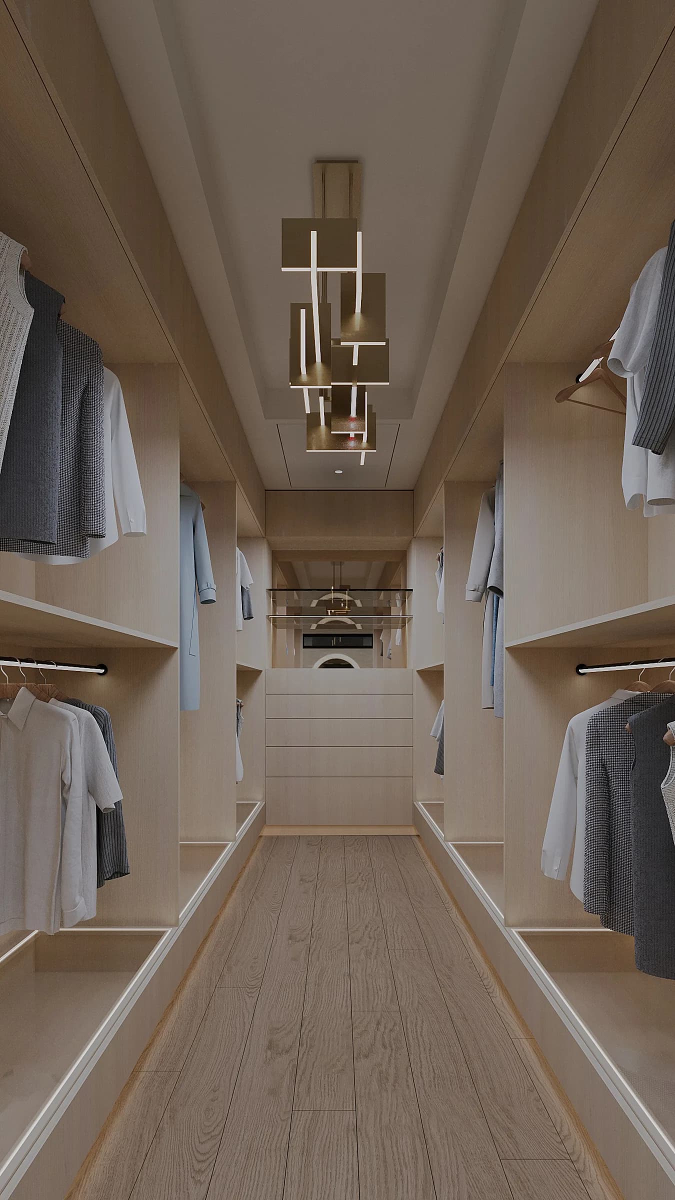 Pale timber walk-in wardrobe with open hanging bays, lit shelving and a sculptural geometric ceiling light