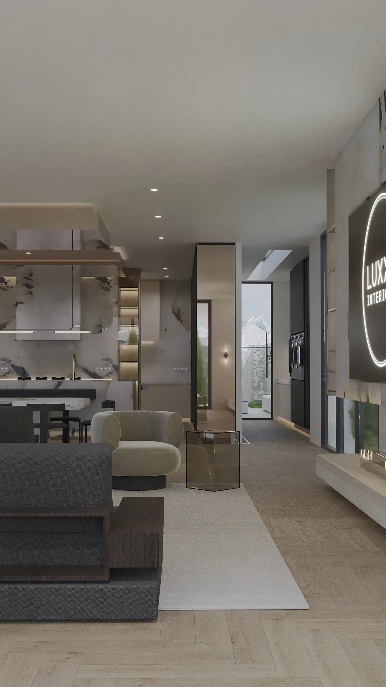 Open-plan living room and kitchen with pale marble joinery, timber flooring and a long stone fireplace hearth