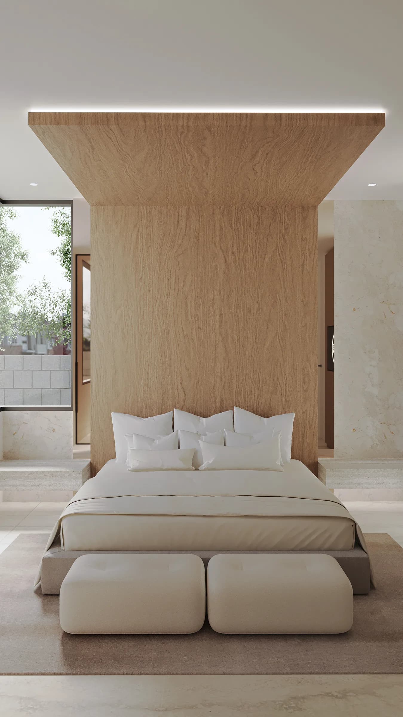 Serene bedroom with layered white bedding beneath a monumental timber canopy and softly lit stone surrounds
