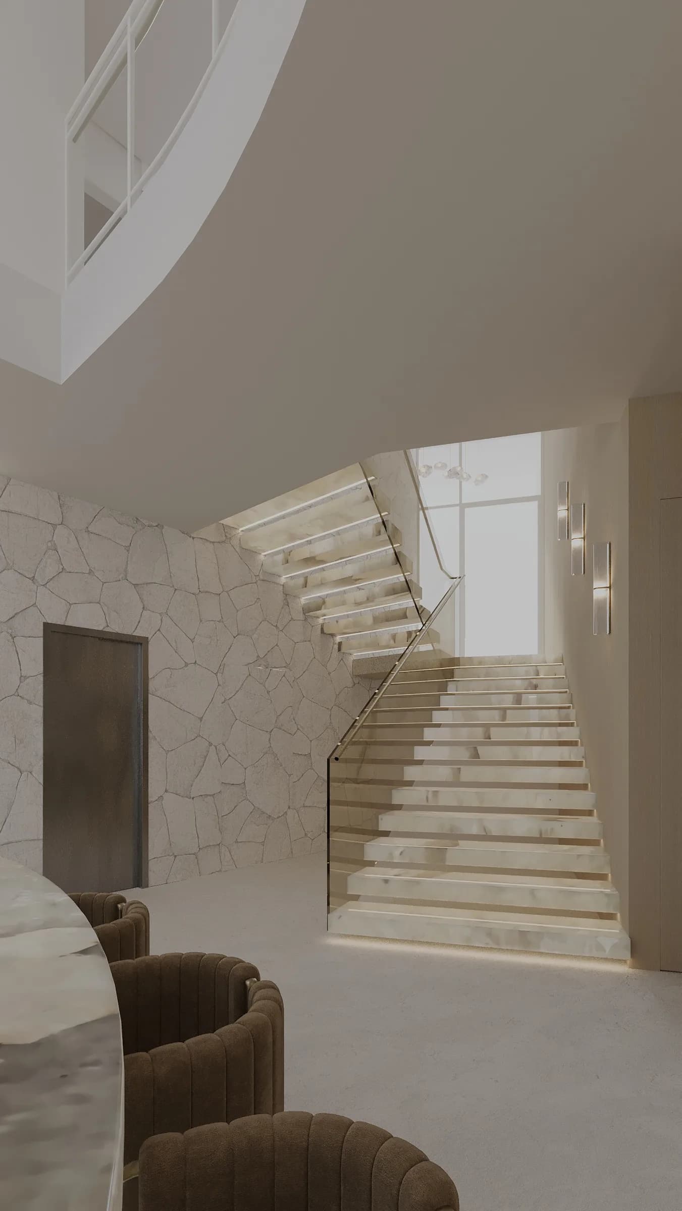 Floating marble staircase with illuminated treads and glass balustrades beside an irregular pale stone wall