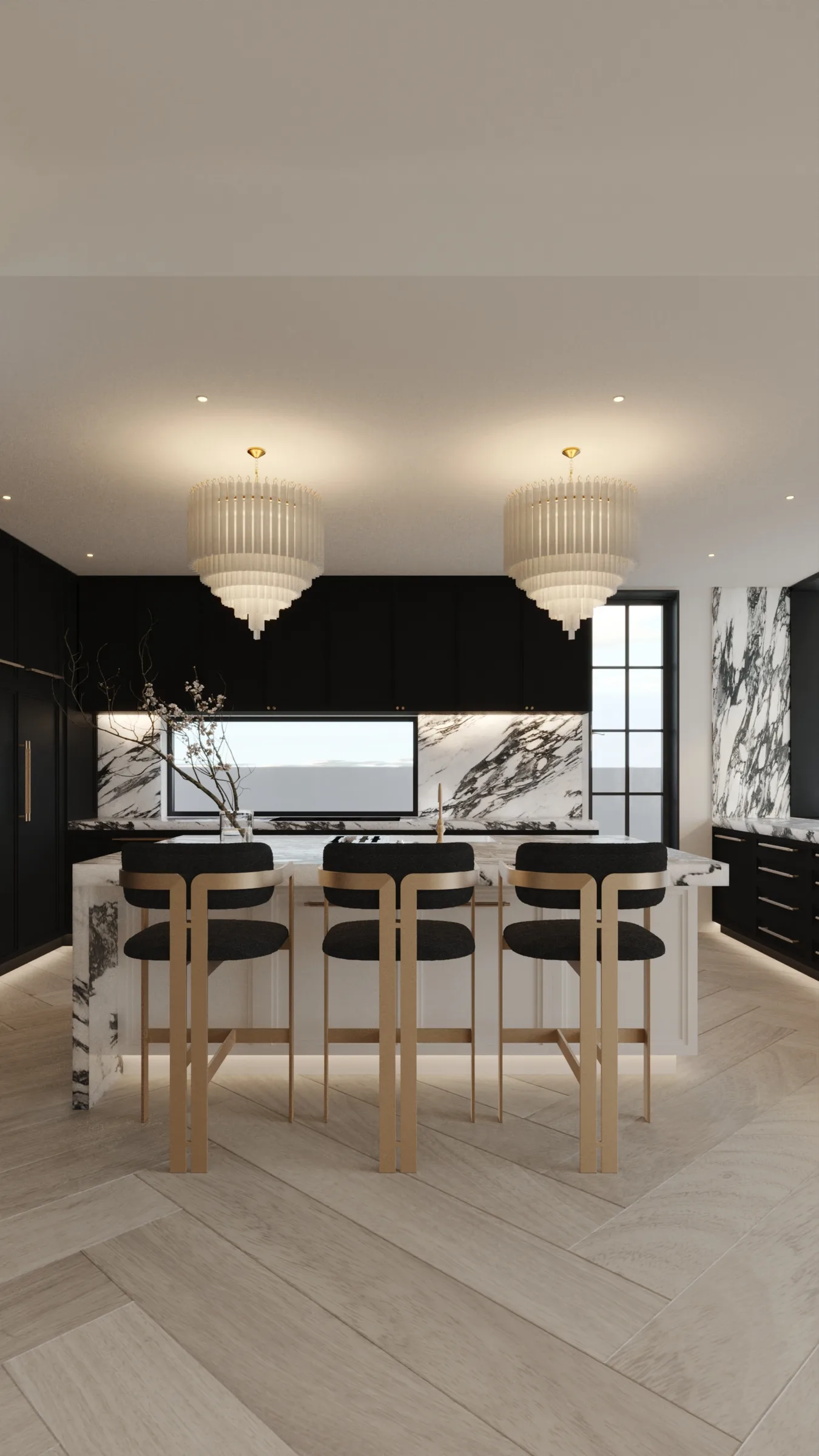 Black kitchen with a boldly veined marble island, brass-framed stools and twin tiered crystal pendants