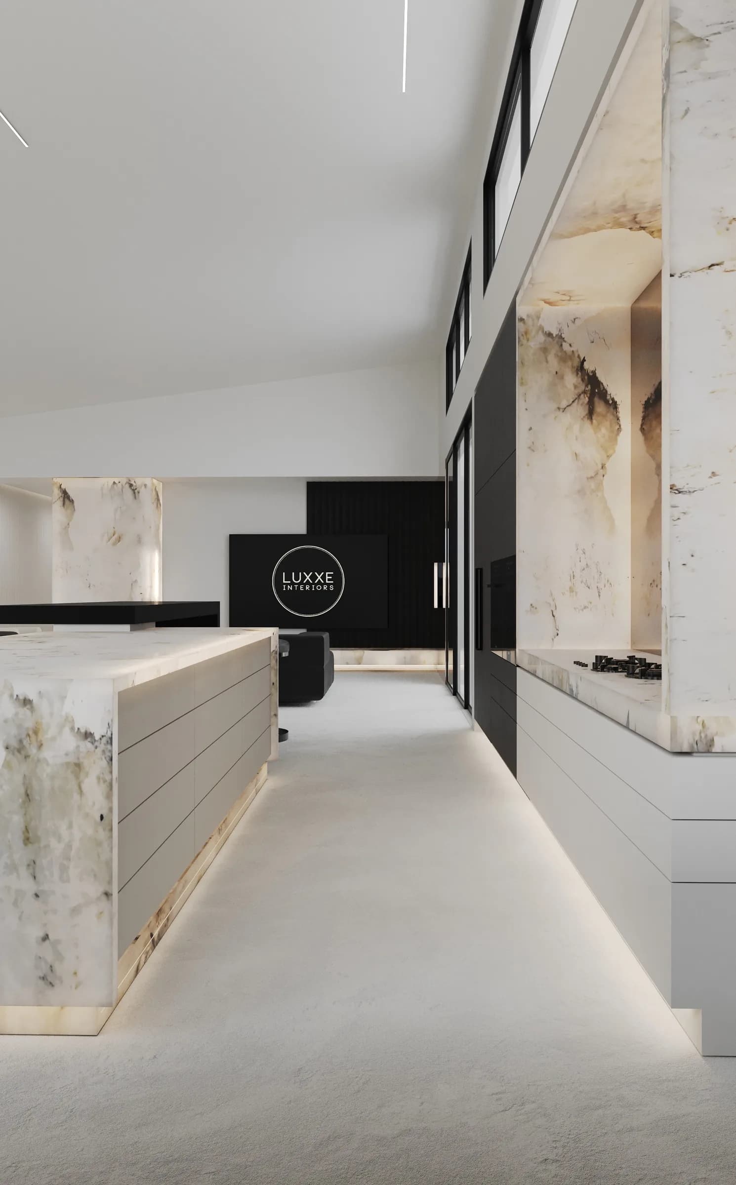 Galley kitchen with matte black cabinetry, a veined marble island and an illuminated stone cooktop alcove
