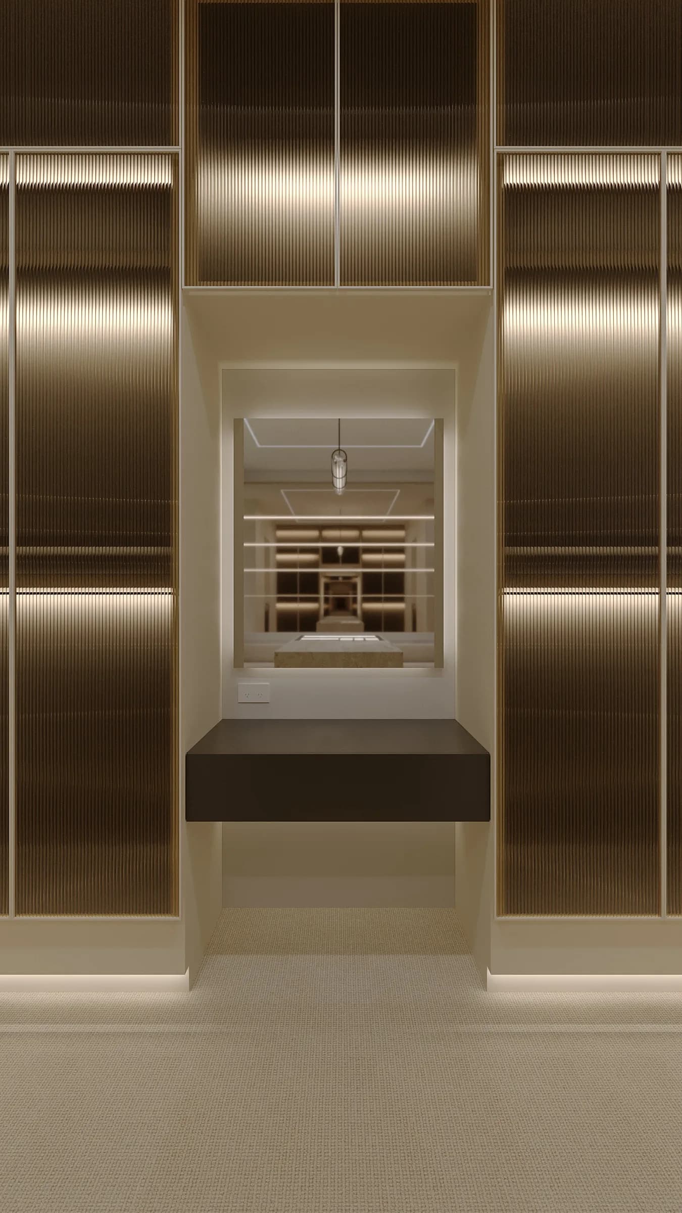 Dressing room lined with bronze fluted-glass wardrobes, warm integrated lighting and a floating vanity before a deep mirror