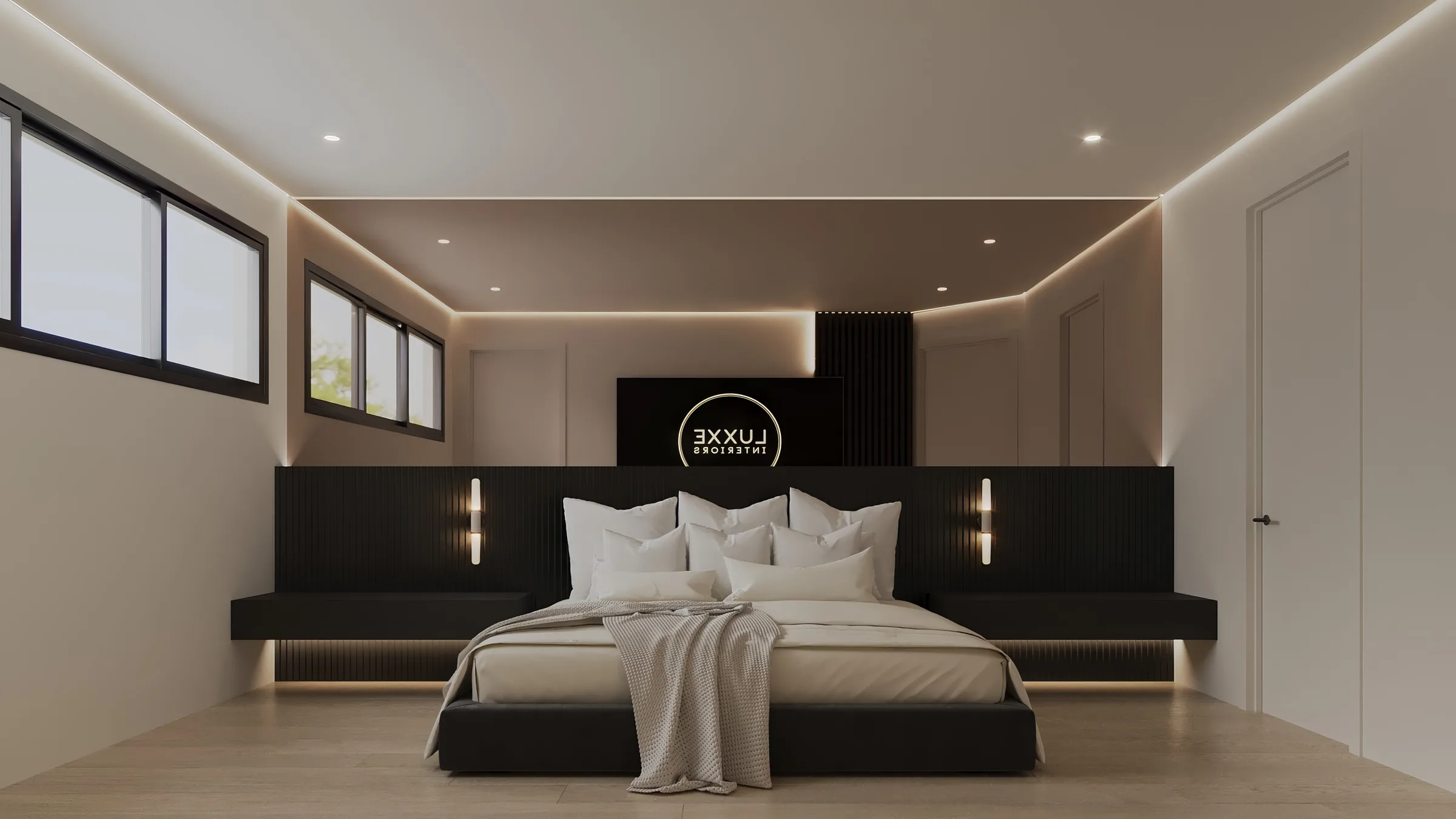 Symmetrical bedroom with ivory bedding, a black fluted headboard and warm perimeter strip lighting