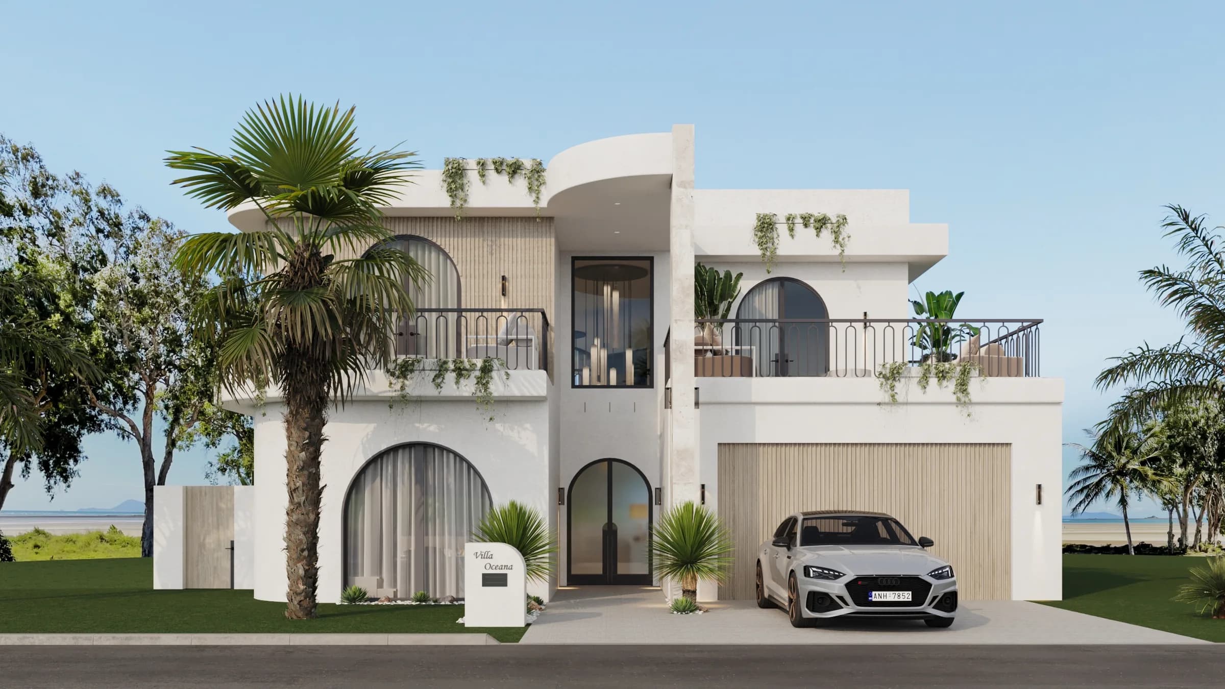 White stucco facade with arched black-framed windows, ribbed stone cladding, iron balconies and cascading greenery