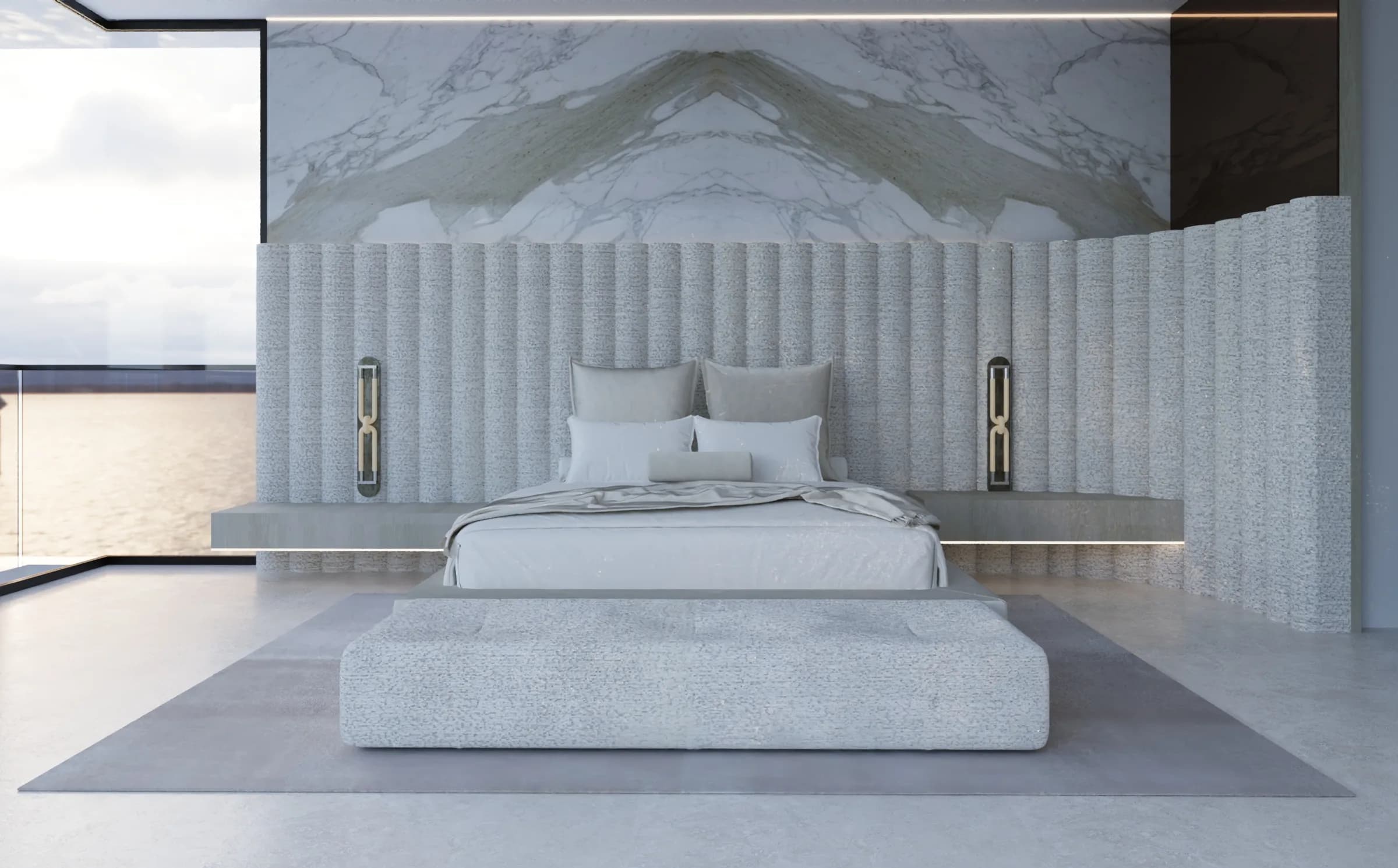 Waterfront bedroom with a sculpted ribbed headboard, pale upholstered bed and bookmatched marble feature wall