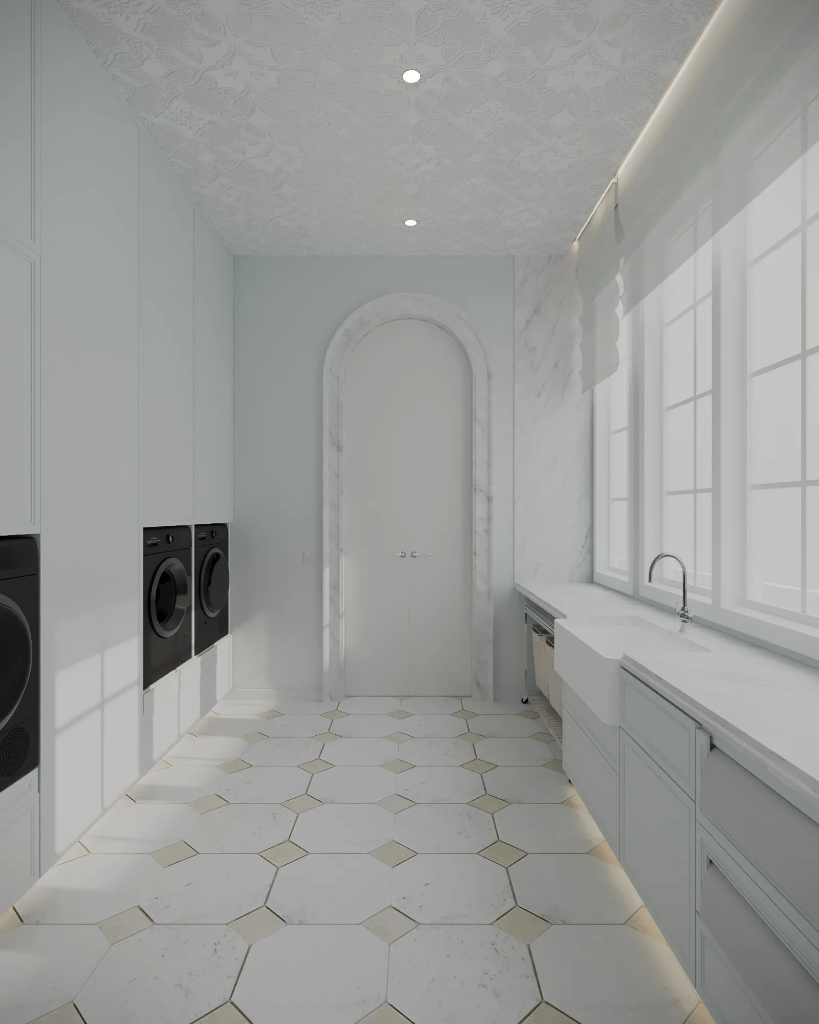 Pale blue laundry with black inset appliances, a farmhouse sink beneath tall windows and an arched marble doorway
