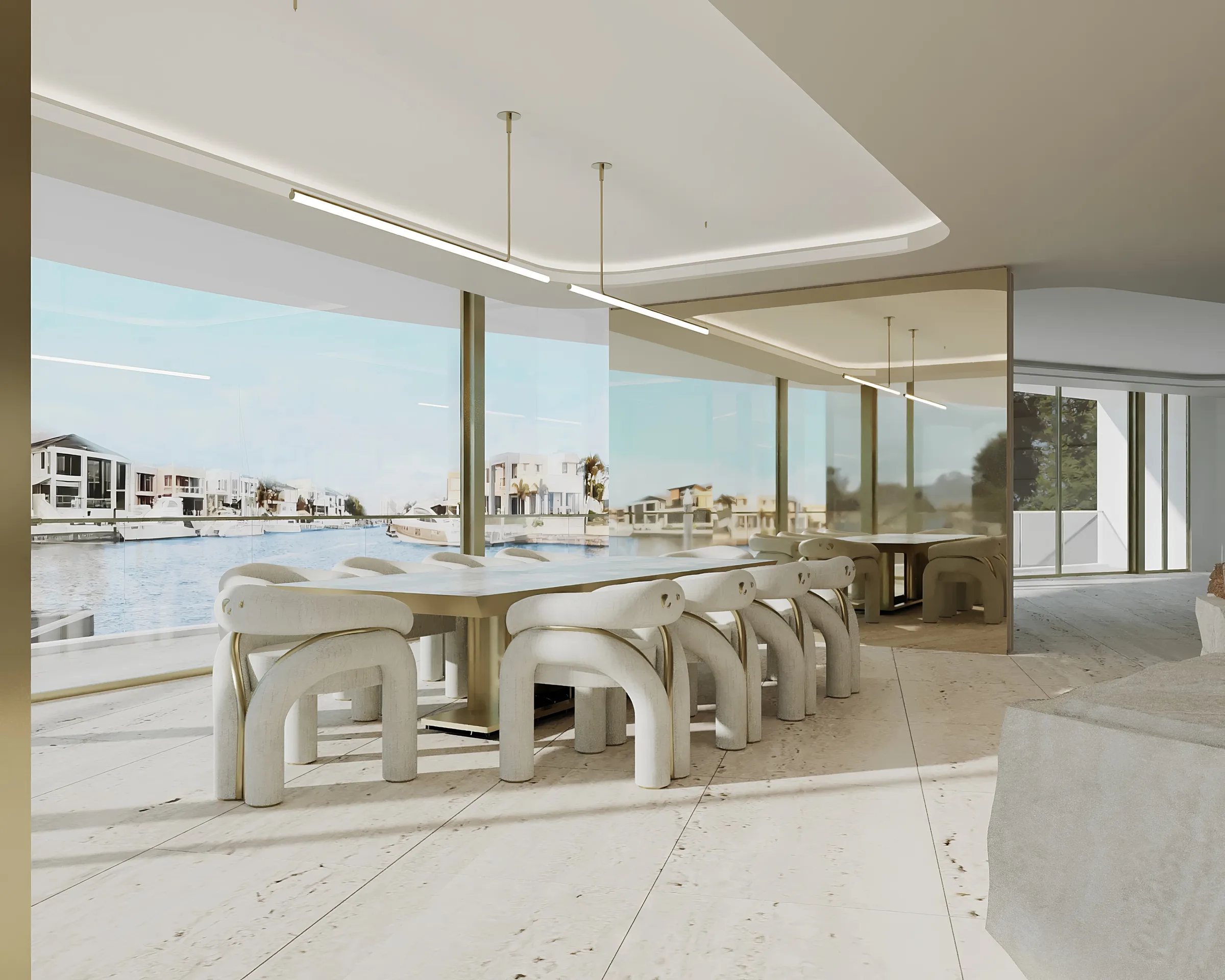 Sunlit dining area with arched cream chairs, a long linear pendant and mirrored walls overlooking the water