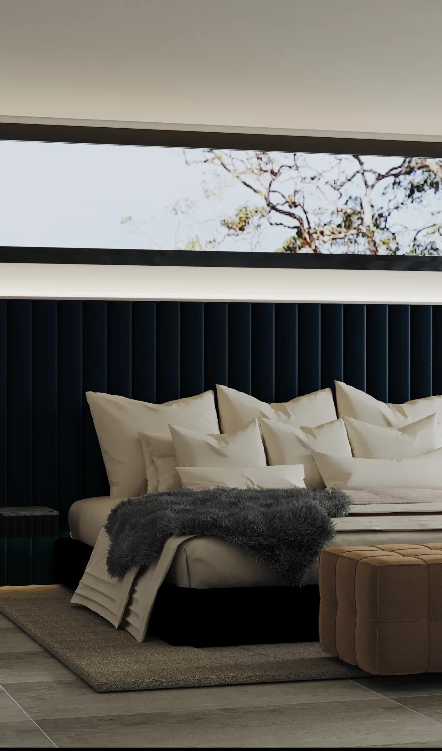 Bedroom with an ivory upholstered bed, black ribbed wall and caramel channelled bench beneath a clerestory window